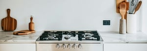 Stylish gas cooker in a light kitchen in a Stockholm apartment-3-1